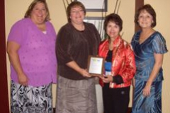 Dr. Radd with Linda Allen, a former student and recipient of the Inviting School Award, Janet and another colleague. 