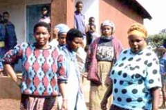 Teachers supervise students between classes at a local school in Tanzania, Africa.