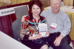 Dr. Radd with Dr. William Glasser, Theorist, purchasing a copy of his book at the ACA Convention in Kansas City, Missouri. April 2004.