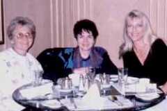 Dr. Radd with two members of the AERA SIG discusing our round table presentations