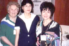 Dr. Radd and Dr. Myung Sook Lee, Department of Education, Taegue National University of Education, Taegue, Korea, presenters of program on International Perspectives of Developmental Guidance, with Sophia Radd in exhibit area.