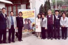 Dr. Radd being welcomed by students of a school in Hong Kong where she traveled as a part of the International Alliance for Invitational Education program in March 2004.