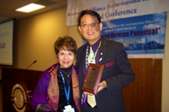 Dr. Radd receiving acknowledgement for being on the Board of Trustees for the International Alliance for Invitational Education.