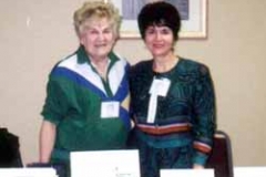 Dr. Radd and Sophia Radd at exhibit at the Nebraska Counselors Association 2000 Conference in Omaha, Nebraska
