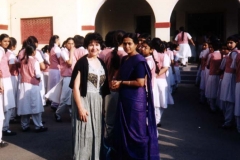 Dr. Radd with teacher and students outside St. Anthony's, a private girls school in Agra, India, on a visit in November 2000.
